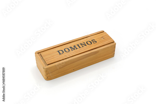 wooden box with the word “Domino” written on it, isolated on a clean white background
