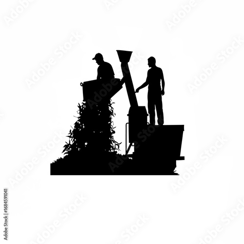 Silhouette of a worker cleaning metal shavings from machinery