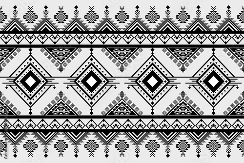 Intricate Geometric Pattern: A captivating monochrome geometric pattern, featuring a symmetrical arrangement of diamonds, triangles, and stylized shapes.