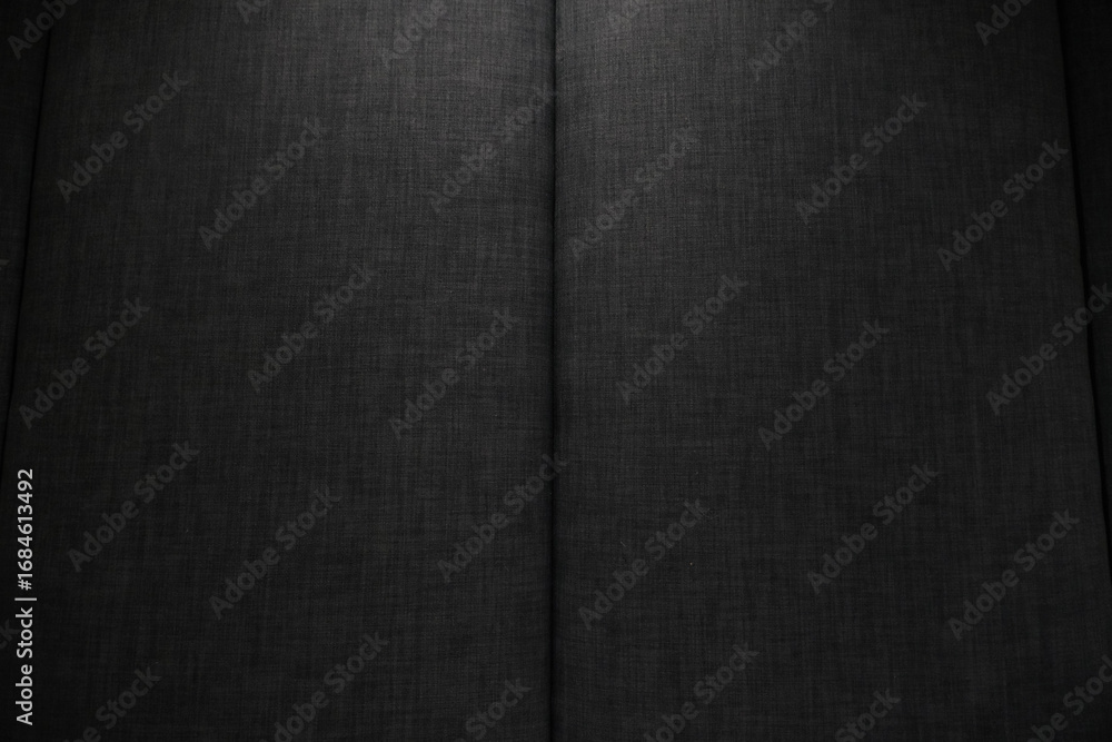 Fototapeta premium Black fabric pattern, black background, black texture