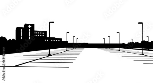 hospital parking lot silhouette empty spaces, streetlights, medical building