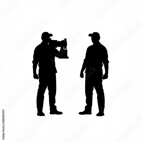 Silhouette of a worker holding a finished cnc machine part