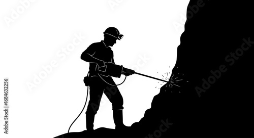 miner silhouette jackhammering rock face, black and white, industrial, extraction, mining
