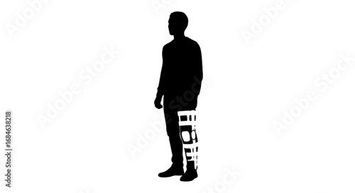 silhouette of a man with leg injury, wearing a leg brace, standing