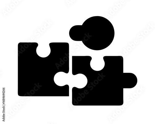 Black silhouette of puzzle pieces connecting together