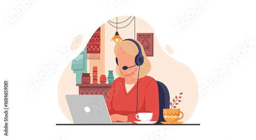 Blonde woman with headset working remotely on laptop from a cozy home office, ideal for business, customer service, or freelance concepts.