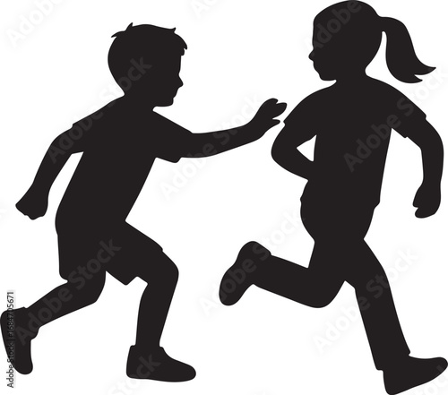 Two children playing a game of tag in silhouette