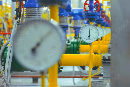 Pressure gauges on the gas pipeline in gas metering room at the LNG plant