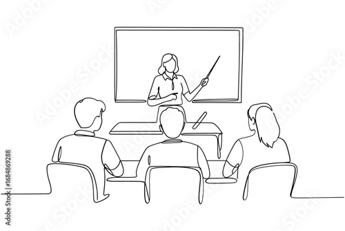 Teacher instructing students in a classroom setting