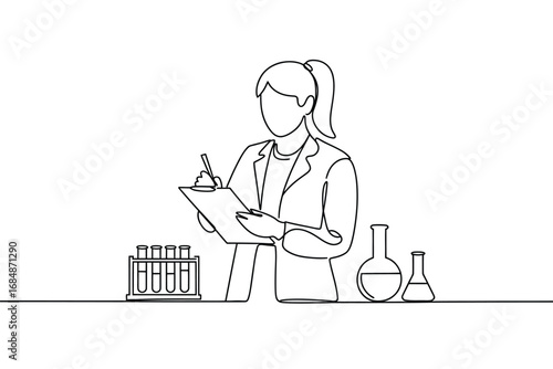 Scientist in lab coat taking notes with test tubes and flasks