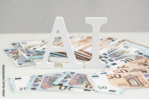 Letters of AI among euro banknotes. income with the help of AI technologies. Earning money with the help of AI on the Internet. Digital business. financial growth with AI, success, wealth
