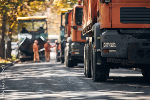 Foto Public city street reconstruction with heavy machines.