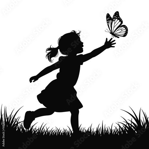 Silhouette of a Young Girl Chasing a Butterfly in a Field of Grass on a Sunny Day, Symbolizing Freedom