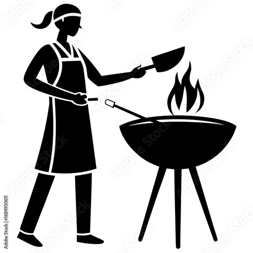Person cooking barbecue with flames grill