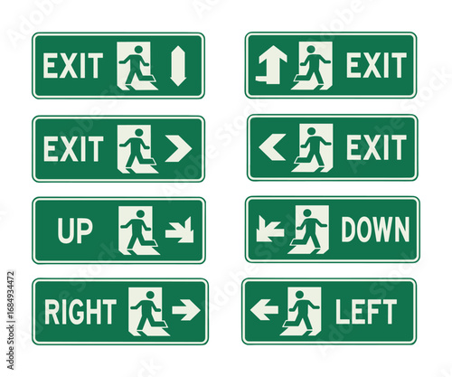 Collection of eight green directional exit signs with running man pictogram emergency escape