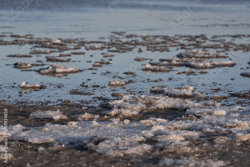 WINTER ON THE SEA COAST - Seawater and ice on the shoreline
