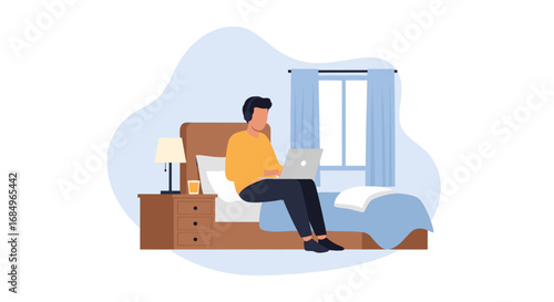 Man working remotely from home in bed with laptop and headphones, enjoying comfort and flexibility. Ideal for remote work, online education, or modern lifestyle.