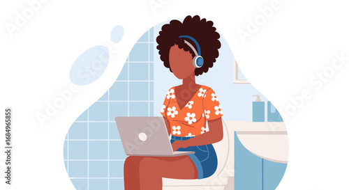 Young African American woman multitasks by working on her laptop with headphones while sitting on the toilet, depicting modern work-from-home lifestyle and flexibility.