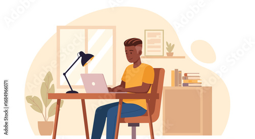 Young man working efficiently on his laptop at a modern home office desk, ideal for remote work, education, or freelance business concepts.