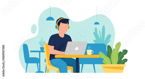 Young man in headphones working remotely on a laptop in a modern cafe. Concept of freelance, online learning, and digital nomad lifestyle.