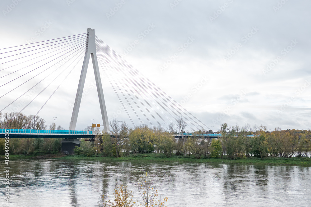 Obraz premium Cable-stayed bridge spanning the river Rhine near to Neuwied under cloudy sky
