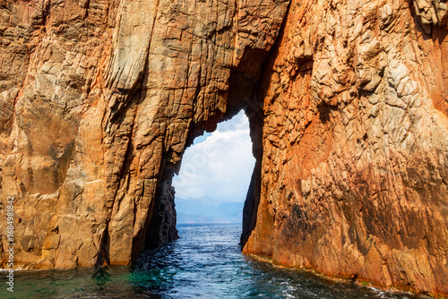 Rock arch opening to the sea, France, Corsica, Piana, 19 June 2025