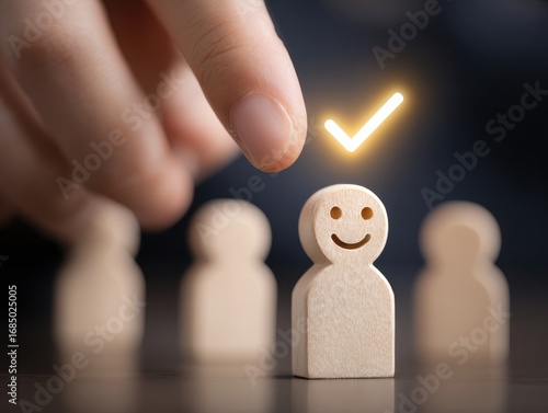 Recruitment and Leadership Selection, A hand pick a smiling wooden figure with a glowing checkmark, symbolizing recruitment, employee selection, customer satisfaction, leadership, or personal success.