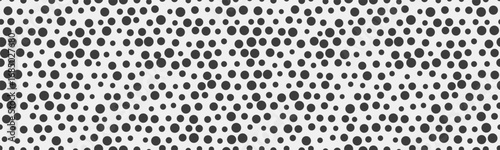 Round spotted pattern with abstract geometric circles. Ideal for seamless wallpapers, textile prints, or trendy backgrounds with a creative touch.