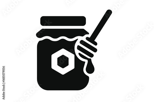 Sweet honey jar with a dipper on a plain background for culinary and health purposes