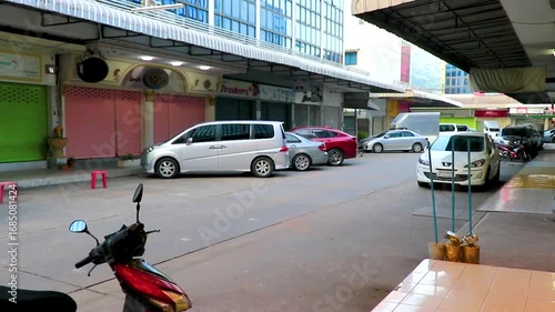 Wallpaper Mural Tourist street between bars restaurants hotels palm trees Bangkok Thailand. Torontodigital.ca