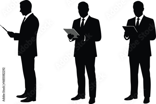 Wallpaper Mural Business professionals using digital tablets, corporate men working with technology, modern office communication, teamwork, silhouette businessmen, professional attire. Torontodigital.ca