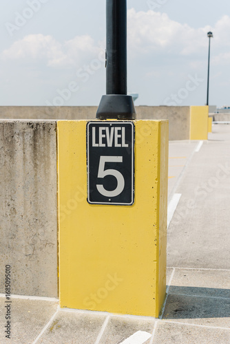 Parking deck level sign with number 5.