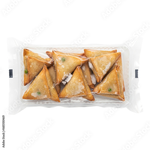 Photo of a clear plastic package containing several goldenbrown fried samosas with green peas visible inside, isolated on a transparent background