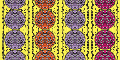 African pattern, African design, colorful, yellow, purple,orange. bohemian seamless fabric style, Chitenge fabric made from Dutch wax, circle motif, Ankara beautiful flowers circle. yellow background.