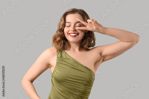 Beautiful young woman with ...