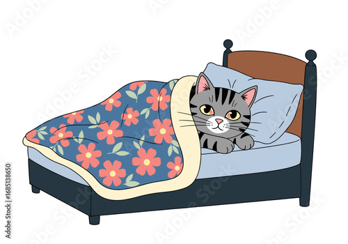 Adorable tabby cat snuggled comfortably in cozy bed under floral blanket feeling sleepy