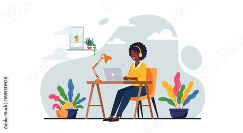 Happy African American woman working from home on a laptop, wearing headphones in a modern, plant-filled environment. Ideal for remote work, online learning, or digital nomad concepts.