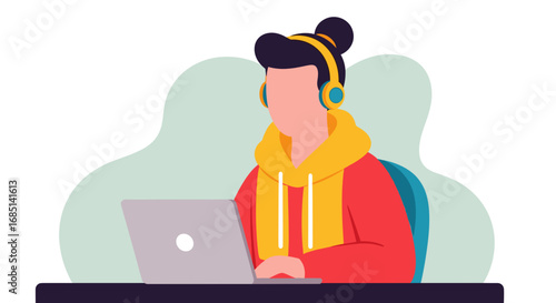 A focused person in headphones works on a laptop, representing remote work, online education, or a modern digital lifestyle. Ideal for technology and business concepts.