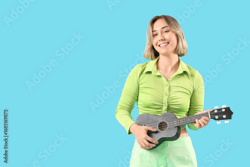 Beautiful woman playing uku...
