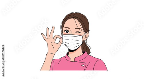 Healthcare professional wearing a face mask gives a positive ok gesture encouraging health safety