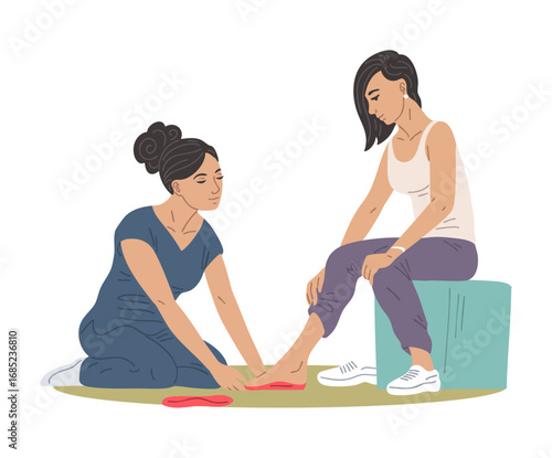Orthopedic doctor helps woman choose insoles