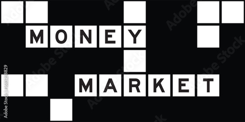 Alphabet letter in word money market on crossword puzzle background