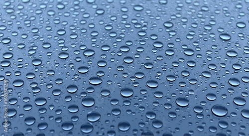 Wallpaper Mural Close-Up of Water Droplets on a Smooth Blue Surface after the Rain Torontodigital.ca