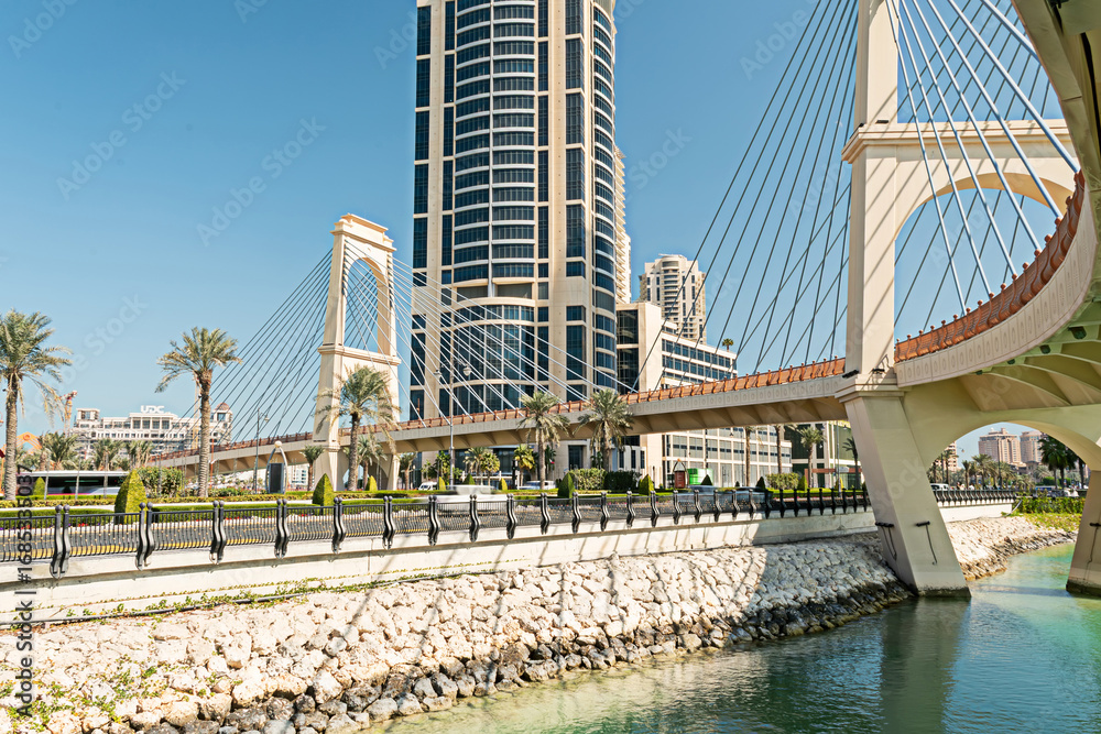 Obraz premium View of bridge and skyscraper in Doha. Qatar