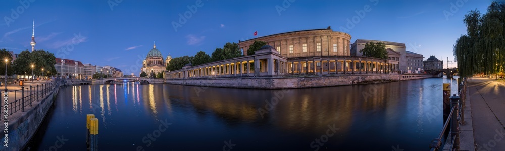 Naklejka premium Panorama of the Museum Island in Berlin with the TV Tower and the cathedral at twilight