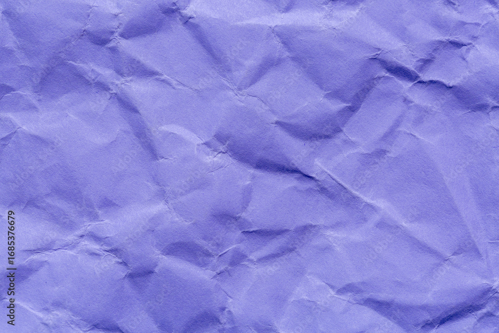 Obraz premium Close-up macro of wrinkled purple paper texture,Abstract light purple paper texture background. Texture of crumpled craft paper. Paper background. Recycled violet paper backdrop in close up.