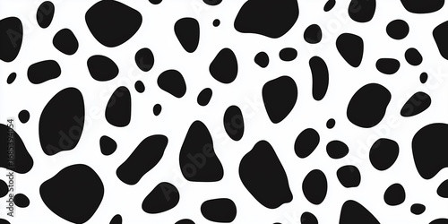 A simple black and white pattern resembling the spots of a dalmatian dog.
