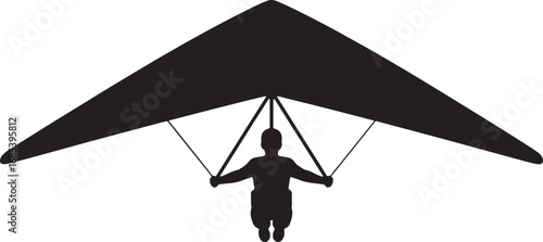 Silhouette of a Hang Glider Pilot Soaring Through the Air in an Outdoor Adventure
