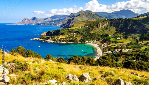 Fototapeta Naklejka Na Ścianę i Meble -  Scenic coastal view, turquoise bay, lush hills, mountains meet sea