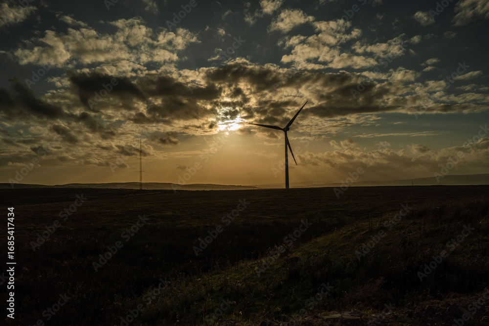 Obraz premium wind farm at sunset